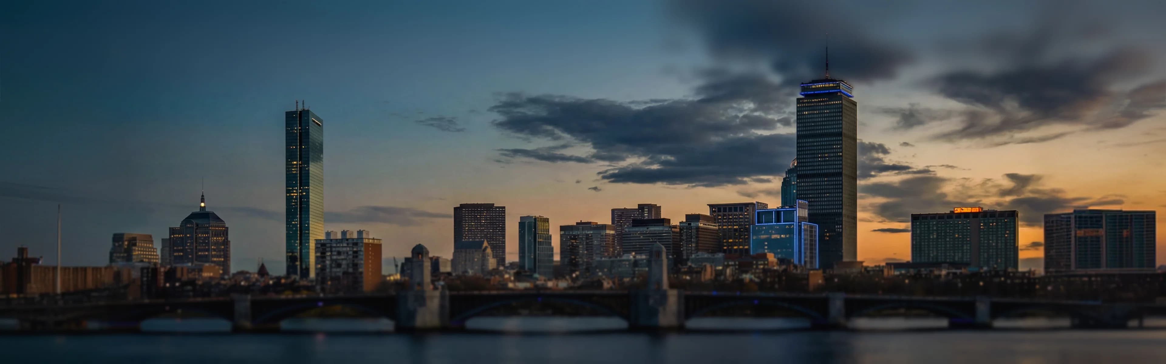 Boston skyline with waterfront and historic architecture - managed Wi-Fi, fiber internet, and bulk TV services for Boston multifamily properties