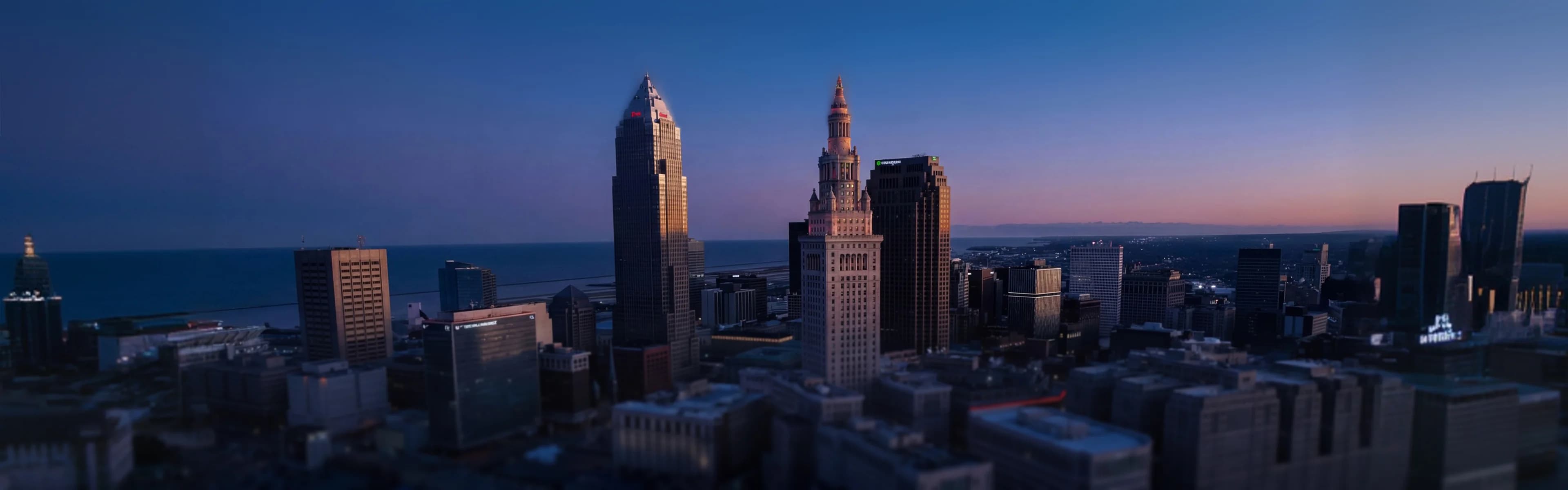 Cleveland skyline with lakefront towers - managed Wi-Fi, fiber internet, and bulk TV services for Cleveland multifamily properties