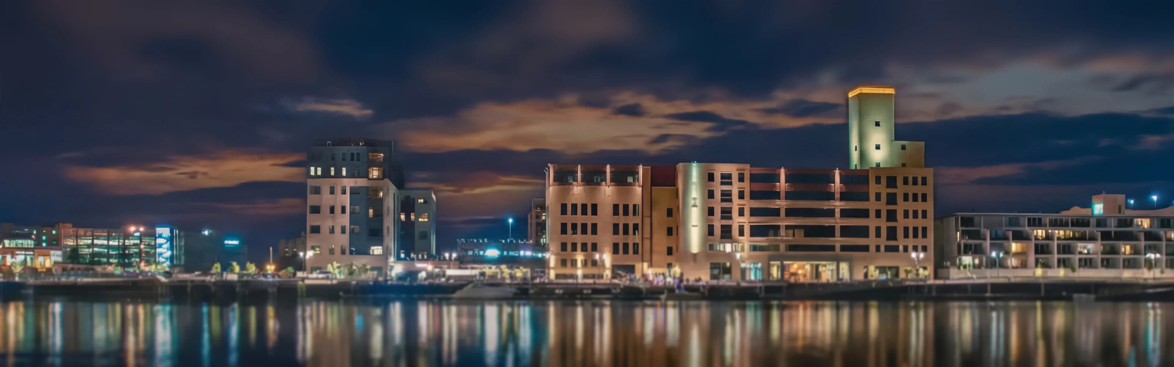 Green Bay skyline and Fox River waterfront - managed Wi-Fi, fiber internet, and bulk TV services for Green Bay multifamily properties