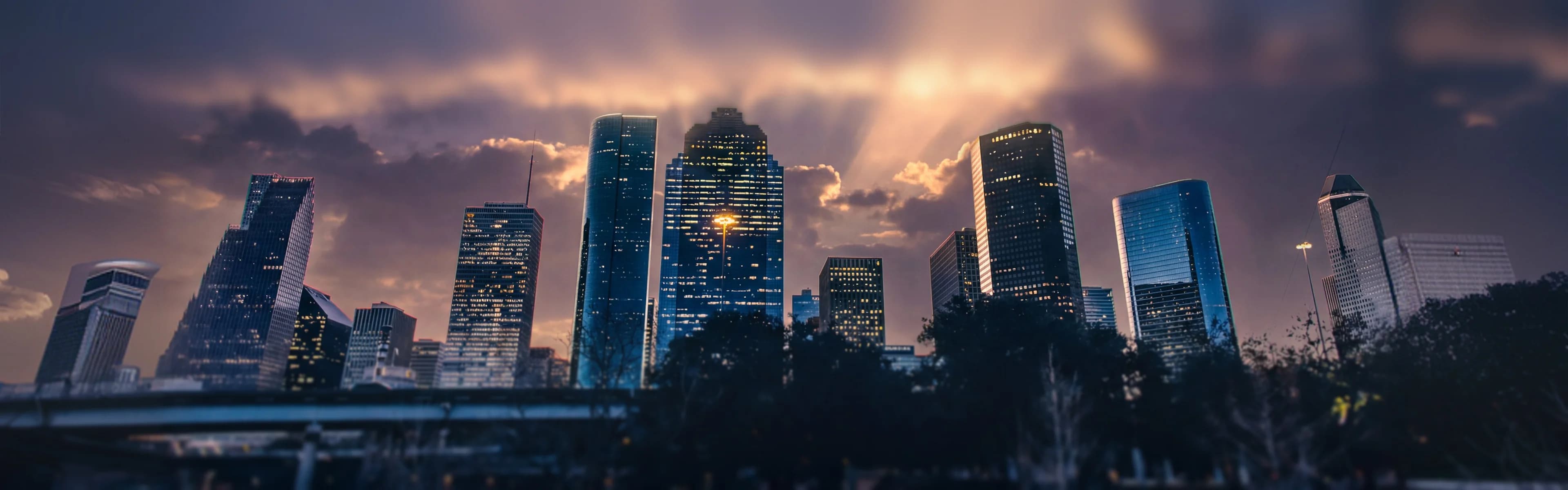 Houston skyline with downtown towers - managed Wi-Fi, fiber internet, and bulk TV services for Houston multifamily properties